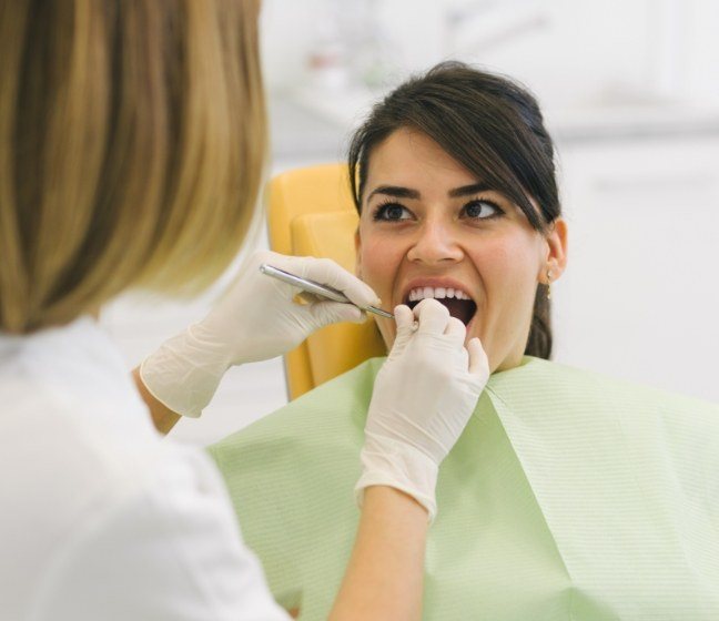 Patient receiving dental treatment on a Saturday