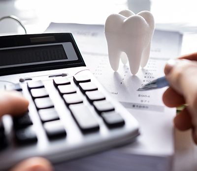 A patient attempting to calculate their dental insurance benefits