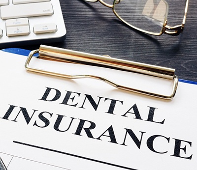 dental insurance form on table