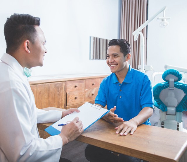 patient asking about cost of implants