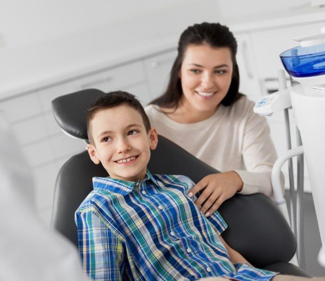 Mother and child at dental office together