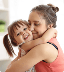 smiling woman with her daughter