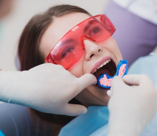 Patient receiving fluoride treatment