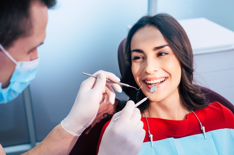 patient smiling during checkup