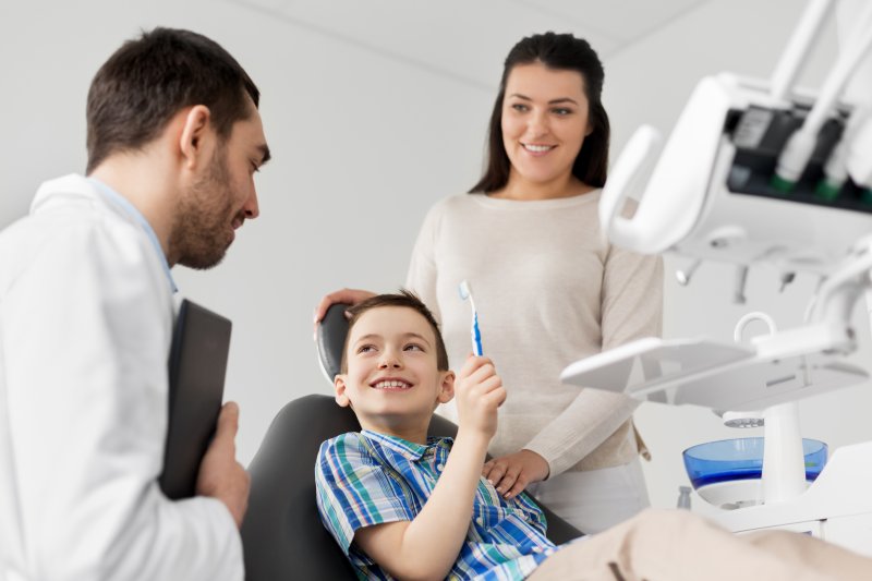 A family dentist seeing a patient
