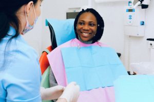 Smiling woman in dental chair