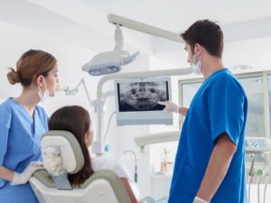 a patient visiting her dentist in Dallas