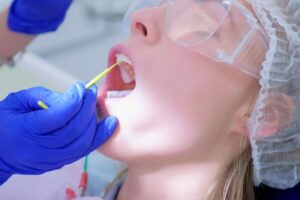 Patient undergoing fluoride treatment. 
